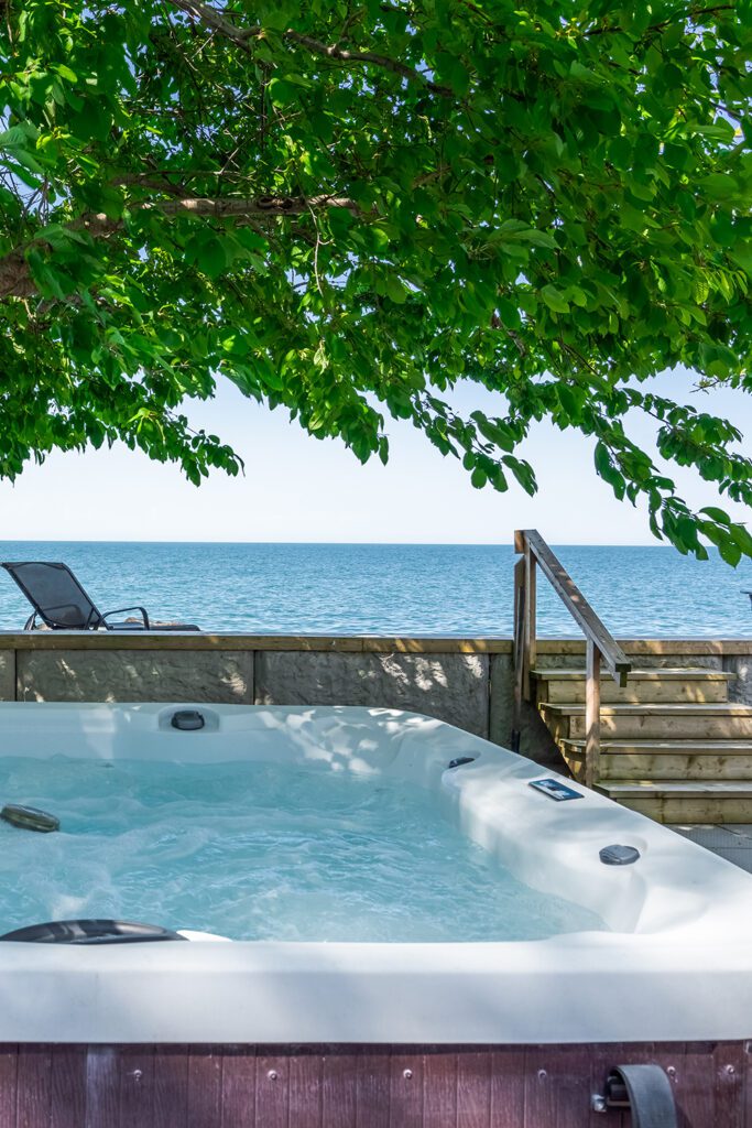 Waterfront property and hot-tub maintained by short-term rental property management company Dream BNB Hospitality.