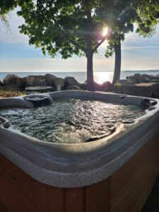 Hydrotherapy Spa overlooking Lake Erie at Dream BNB Hospitality's Hideaway on the Lake vacation home rental.